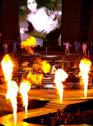 From Robbie Williams' second Brisbane concert, 14th December 2006. That's Robbie in his Adidas hoodie near the drumkit. I can only imagine what it was like to be right next to those flamethrowers when